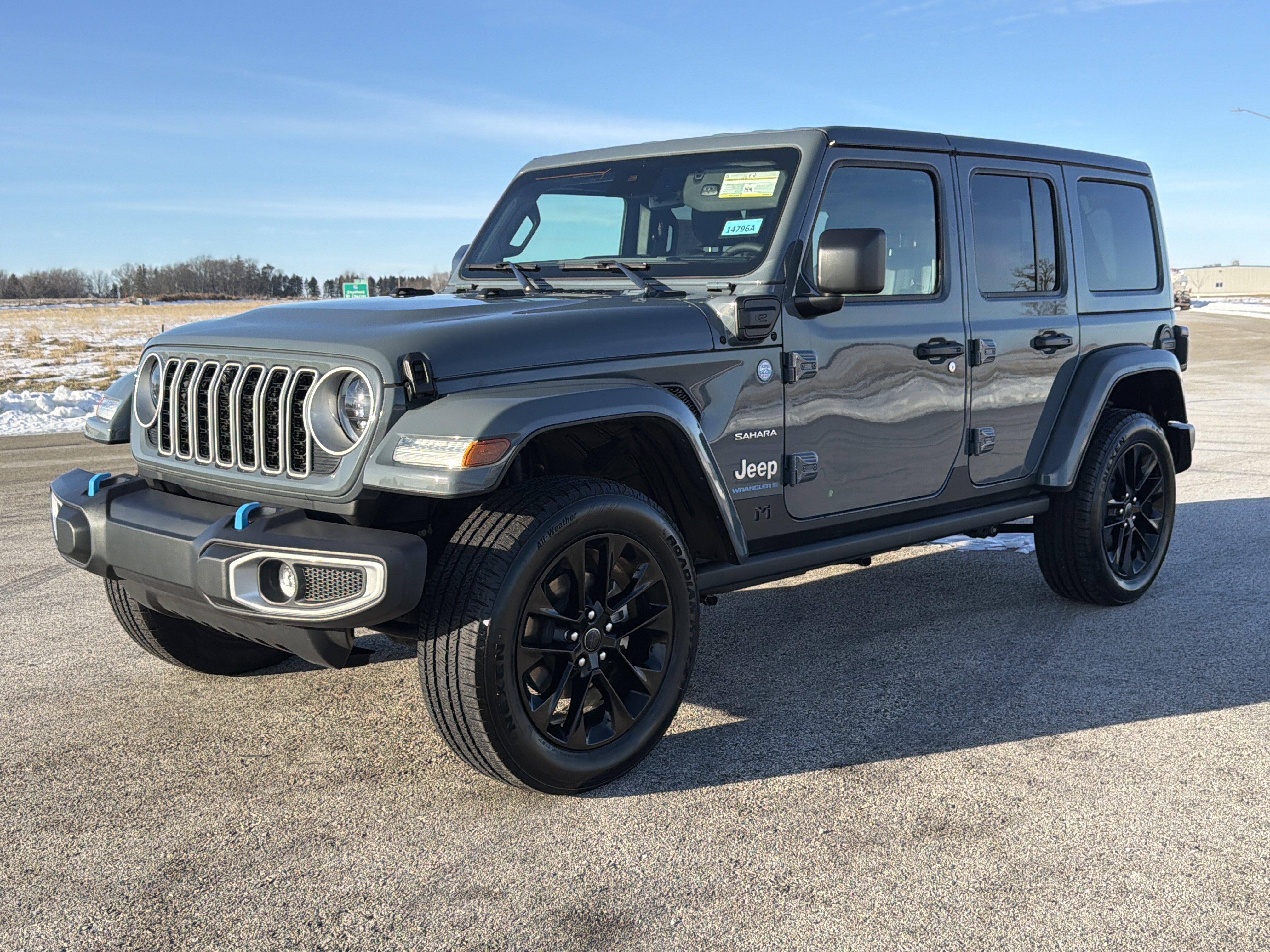 Used 2024 Jeep Wrangler 4xe Sahara 4XE with VIN 1C4RJXP65RW212975 for sale in Saint Charles, Minnesota