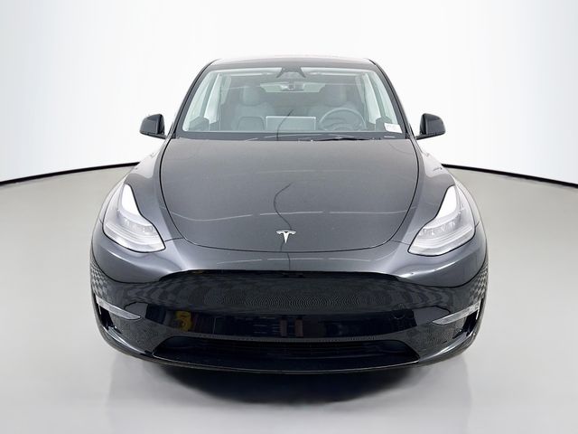 Used 2024 Tesla Model Y Long Range with VIN 7SAYGDED6RF123062 for sale in Bloomington, IL
