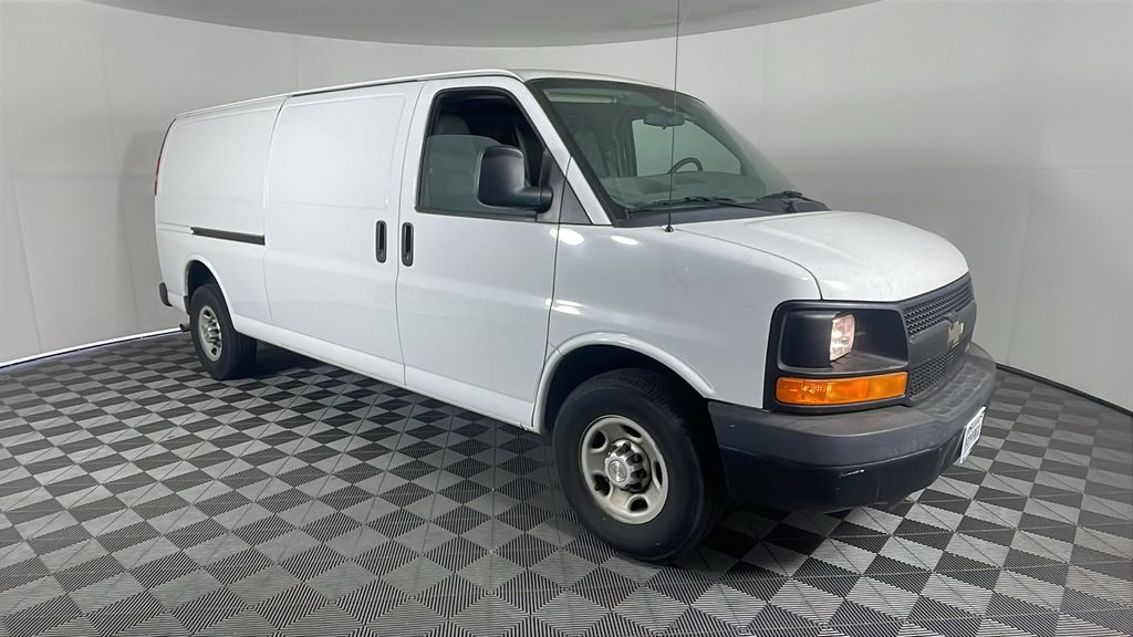 Used 2014 White Chevrolet Work Van image 1