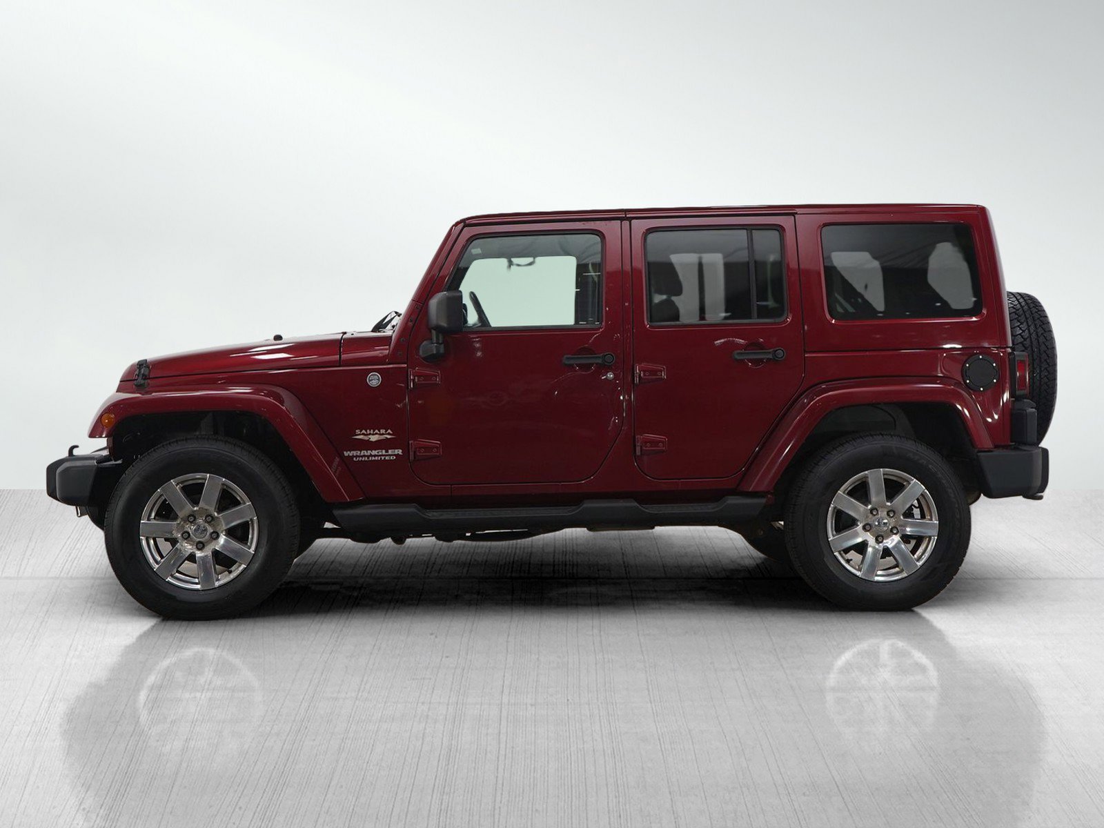 Used 2012 Jeep Wrangler Unlimited Sahara with VIN 1C4BJWEG3CL112325 for sale in Burnsville, Minnesota