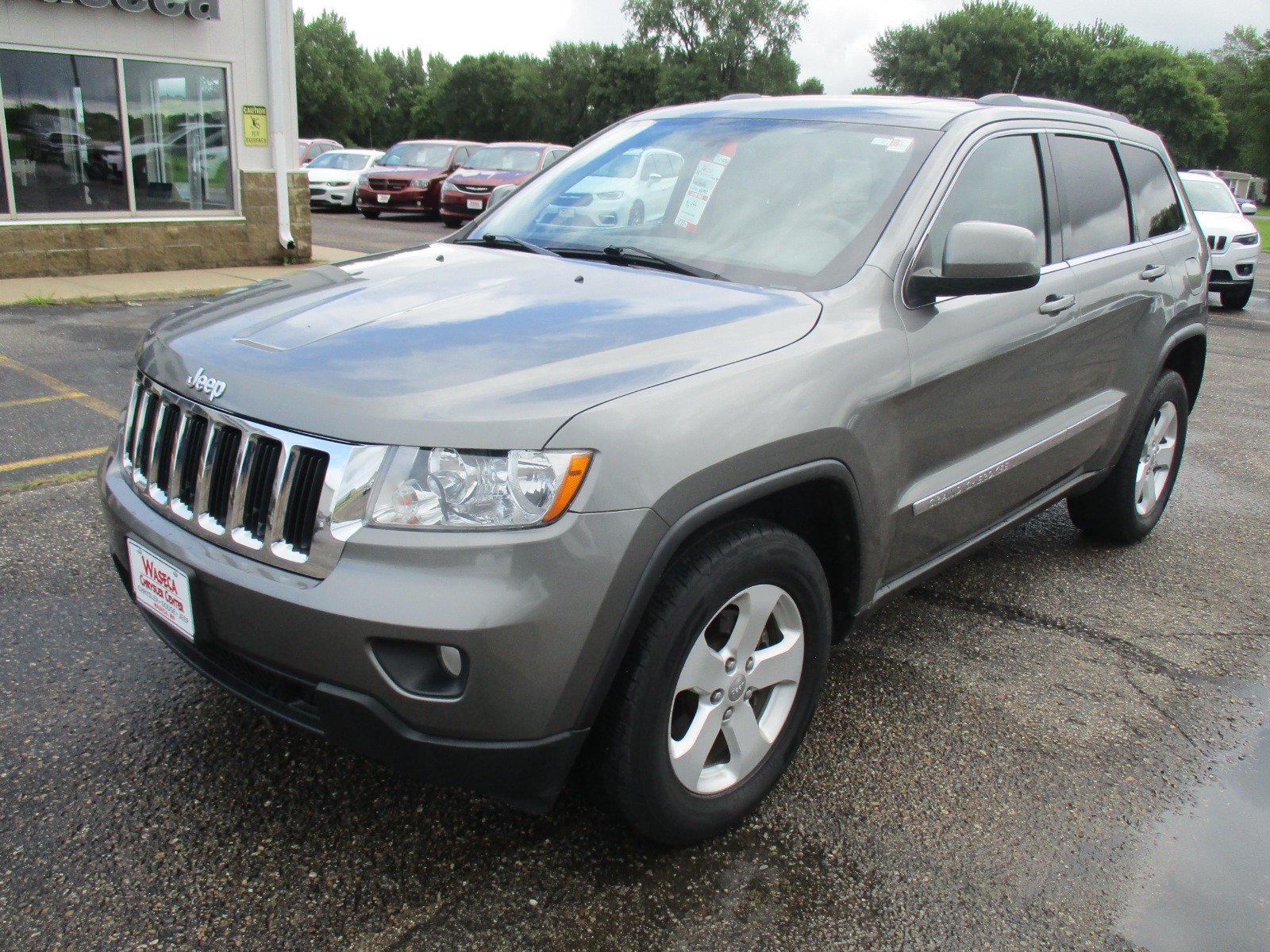 Used 2012 Jeep Grand Cherokee Laredo with VIN 1C4RJFAG9CC149934 for sale in Waseca, Minnesota