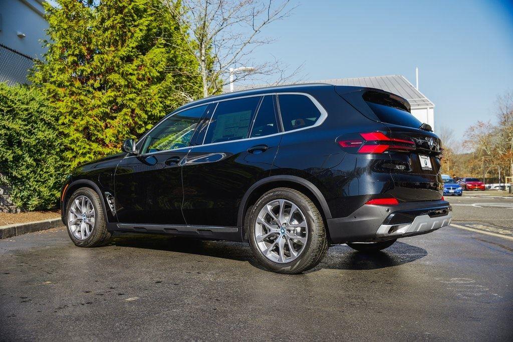 New 2025 Black Sapphire Metallic BMW xDrive50e image 9