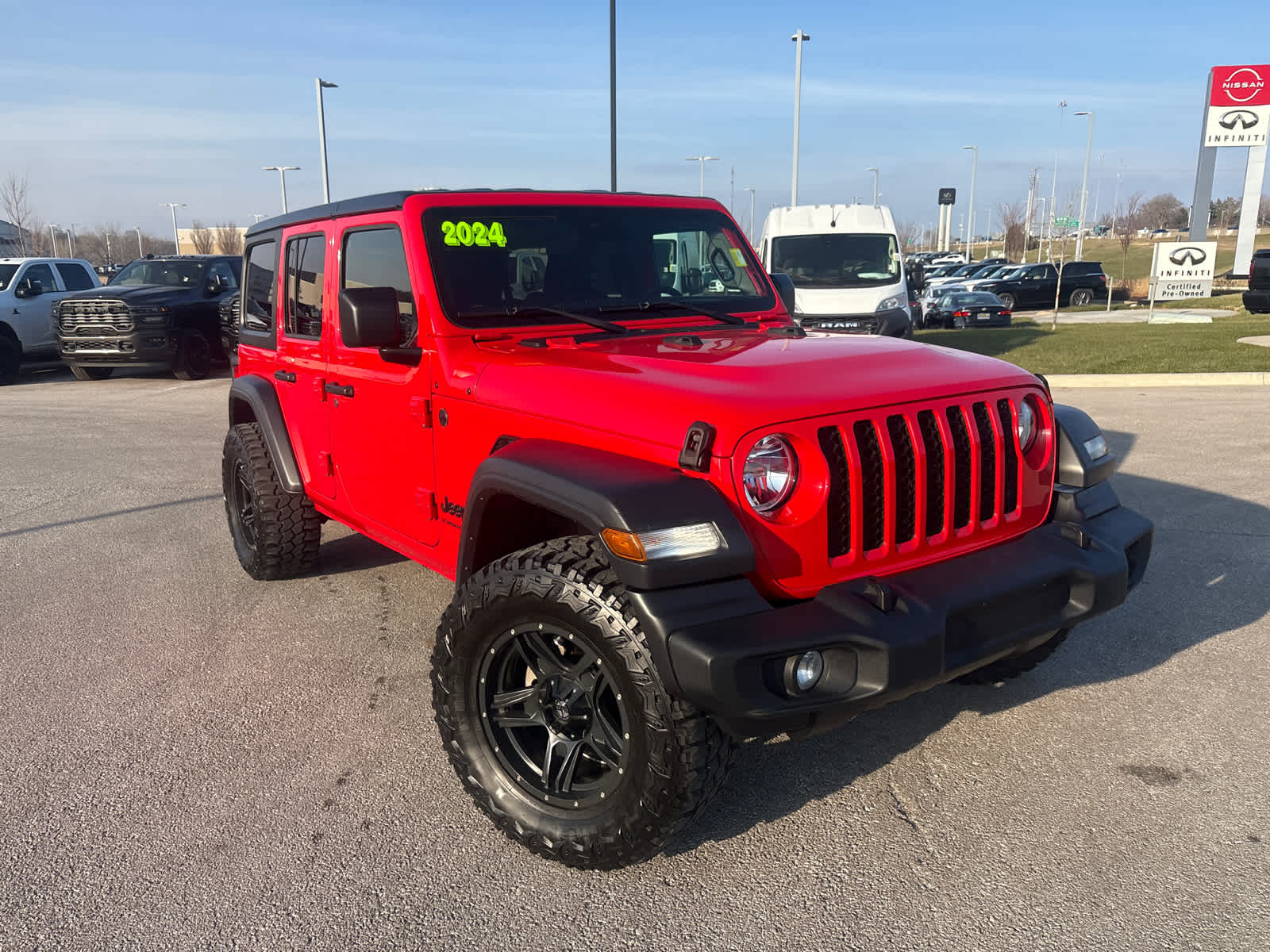 Used 2024 Jeep Wrangler 4-Door Sport S with VIN 1C4PJXDN1RW108003 for sale in Kansas City