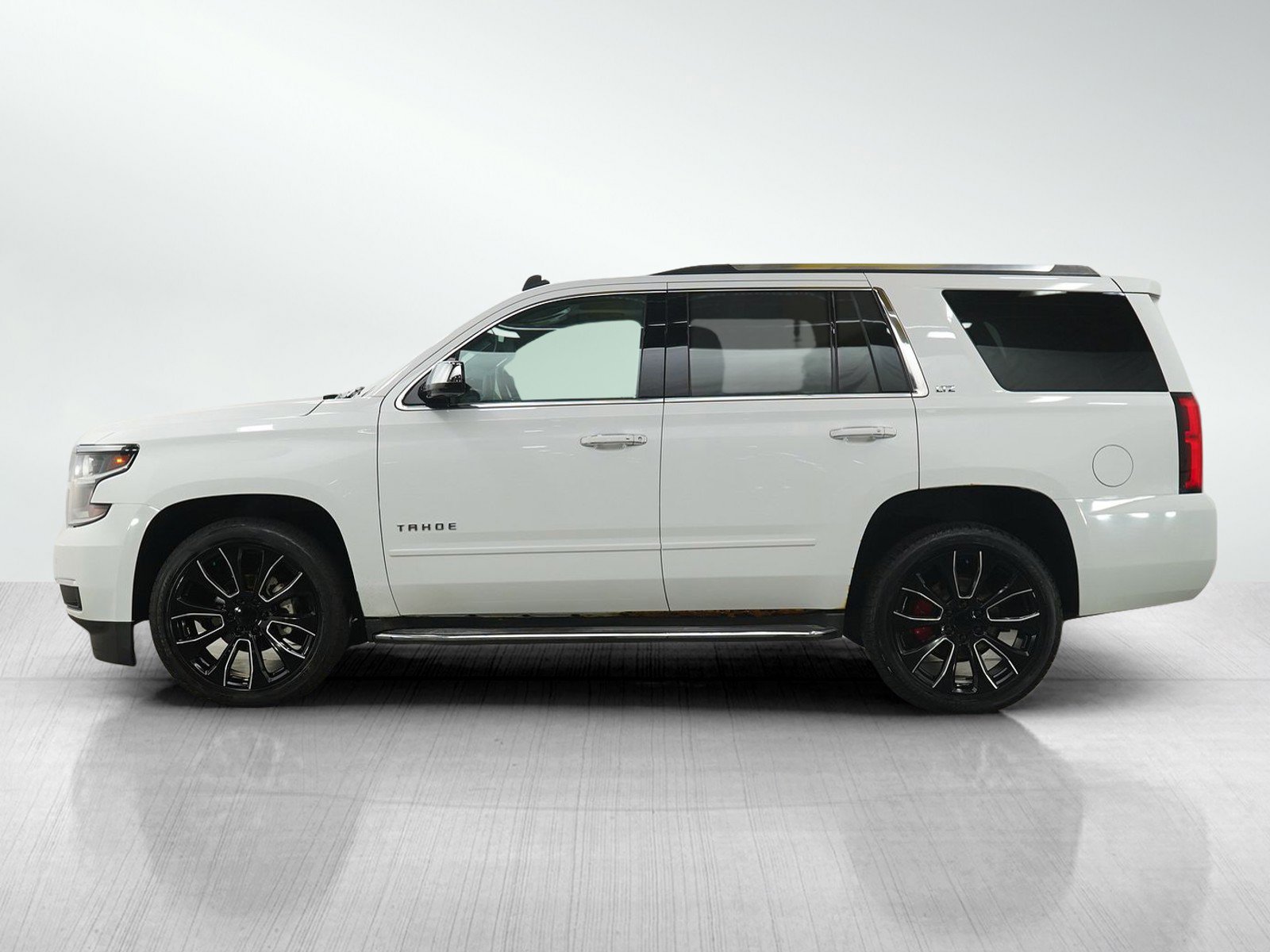 Used 2015 Chevrolet Tahoe LTZ with VIN 1GNSKCKC8FR197135 for sale in Minneapolis, Minnesota