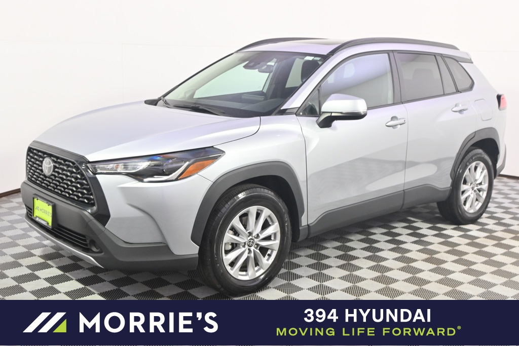 Used 2022 Toyota Corolla Cross LE with VIN 7MUBAABG9NV009165 for sale in St. Louis Park, Minnesota
