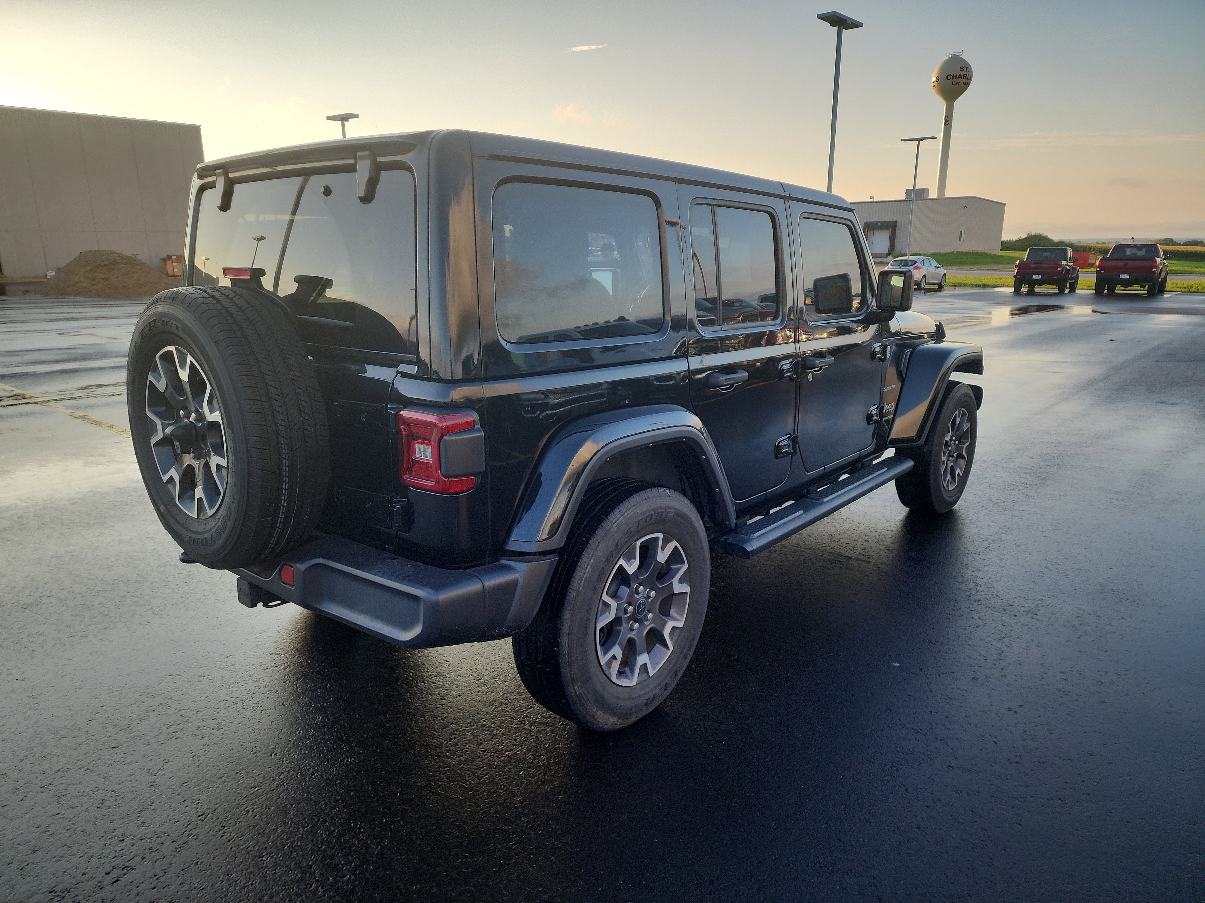Used 2024 Jeep Wrangler 4-Door Sahara with VIN 1C4PJXEN1RW135474 for sale in Saint Charles, Minnesota