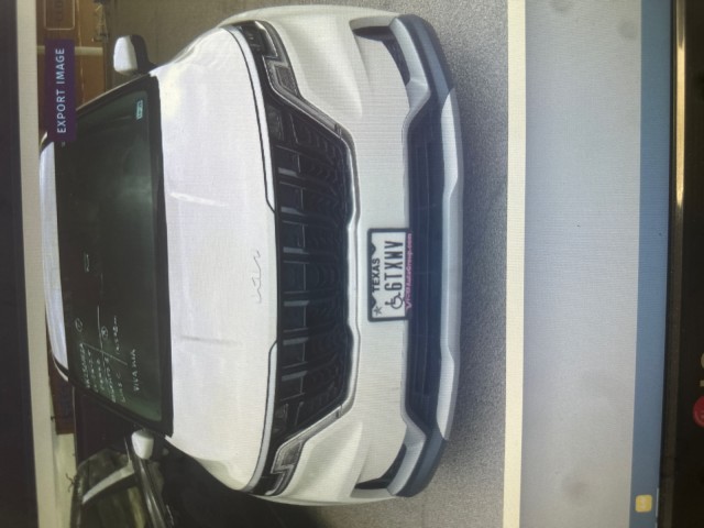 Used 2023 Snow White Pearl Kia LX image 1