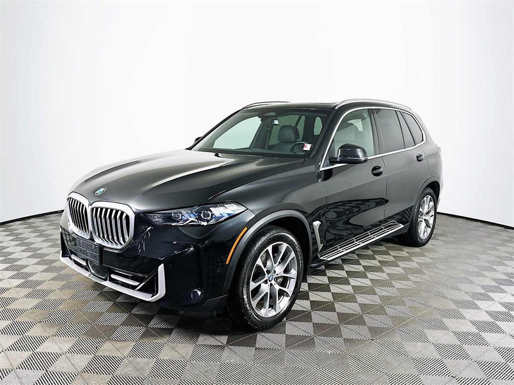 Certified Used 2024 Black Sapphire Metallic BMW xDrive40i image 1