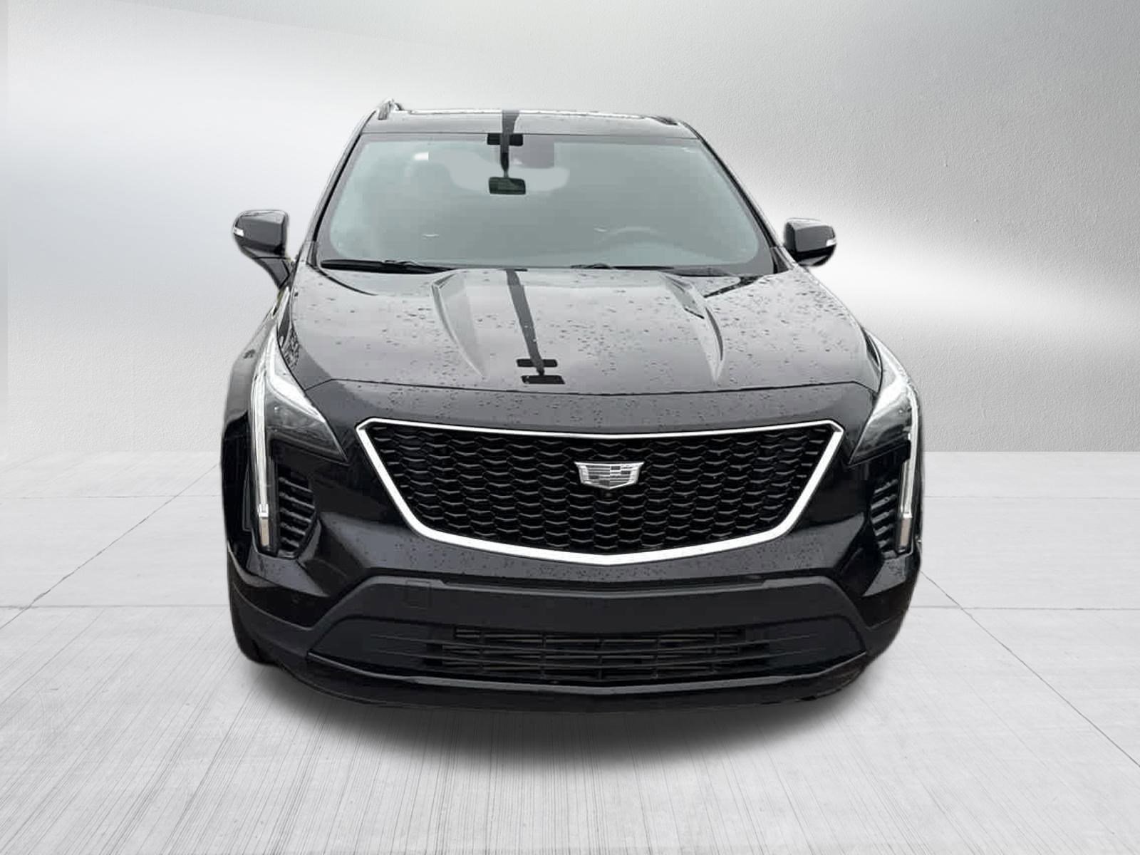 Used 2022 Cadillac XT4 Sport with VIN 1GYFZFR46NF119906 for sale in Brooklyn Center, Minnesota