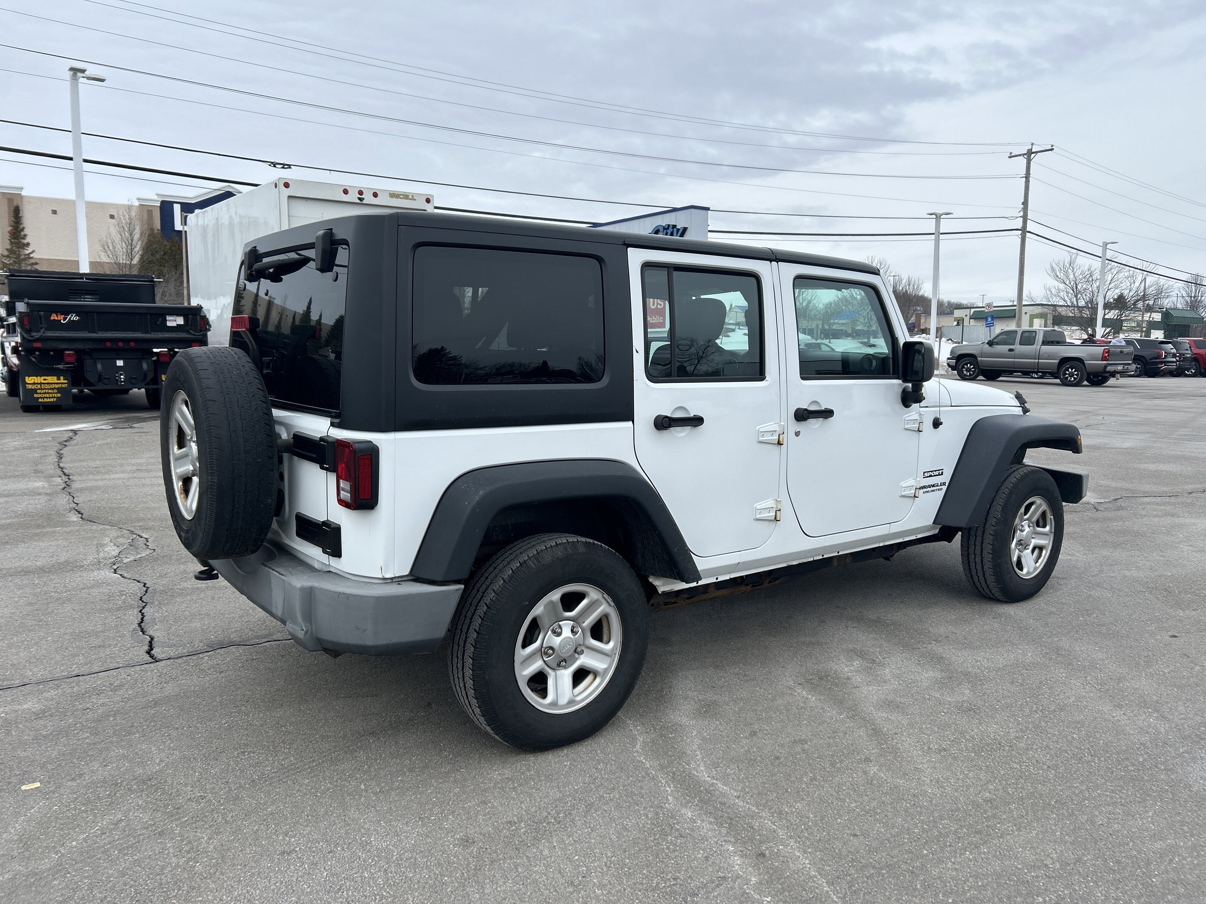 Used 2017 Jeep Wrangler Unlimited Sport with VIN 1C4BJWDG0HL715757 for sale in Portland, ME