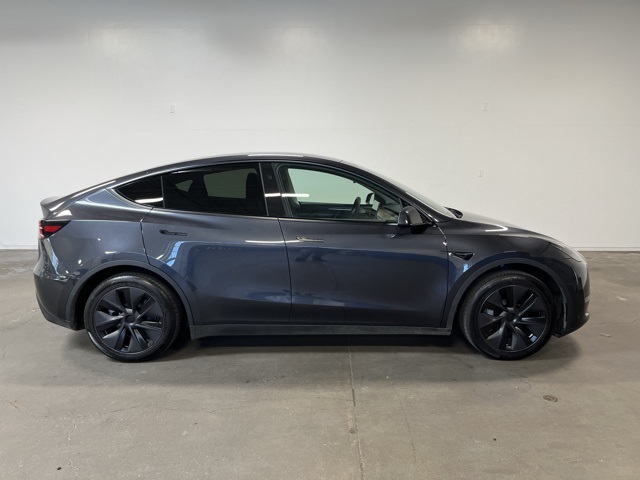 Used 2025 Tesla Model Y Long Range with VIN 7SAYGDED7SF317007 for sale in Kansas City