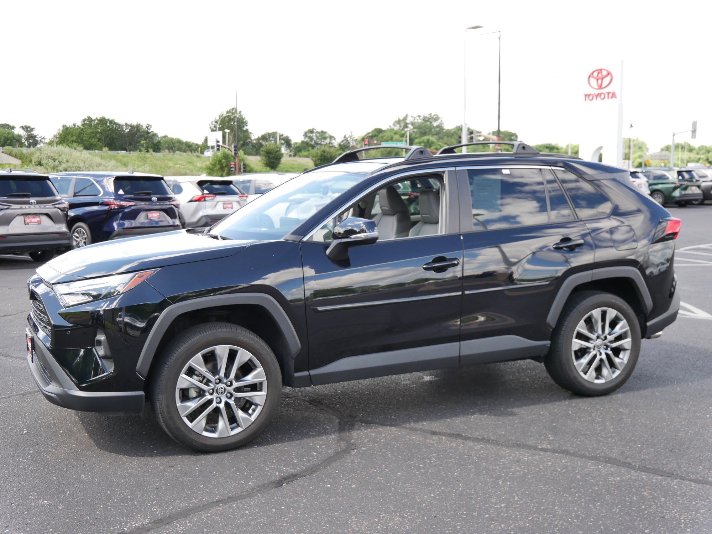 Certified 2023 Toyota RAV4 XLE Premium with VIN 2T3A1RFV6PC334713 for sale in Brooklyn Center, Minnesota
