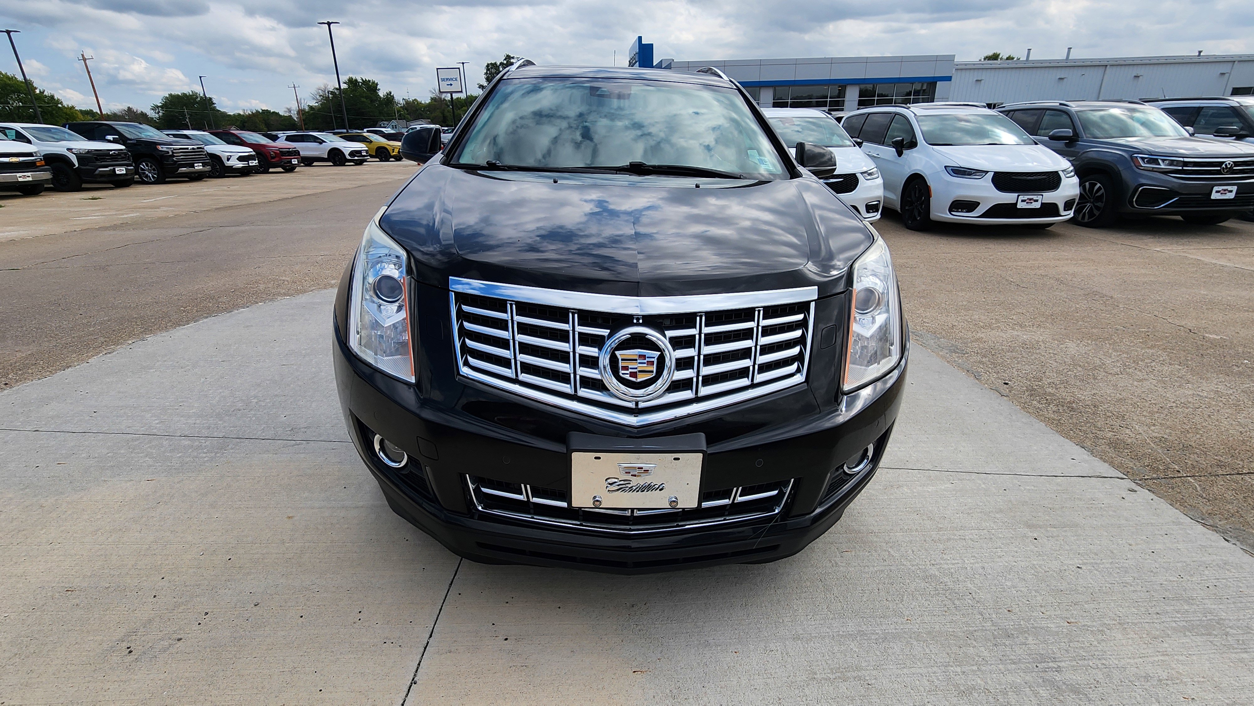 Used 2014 Cadillac SRX Premium Collection with VIN 3GYFNGE38ES524515 for sale in Lake City, IA