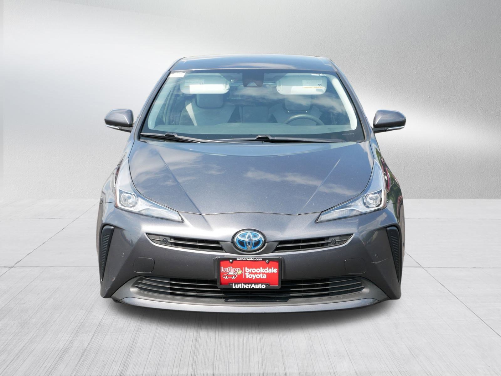 Used 2021 Toyota Prius LE with VIN JTDKAMFU5M3147524 for sale in Brooklyn Center, Minnesota