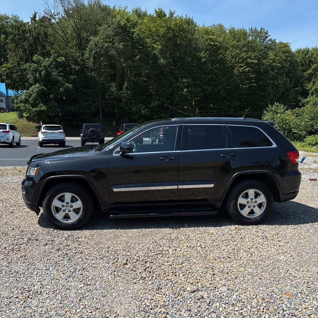 Used 2013 Jeep Grand Cherokee Laredo with VIN 1C4RJFAG8DC626340 for sale in Fowlerville, MI