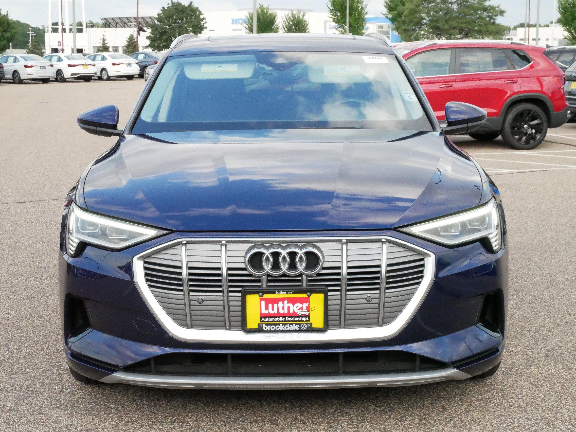 Used 2021 Audi e-tron Premium with VIN WA1AAAGE1MB003051 for sale in Brooklyn Center, Minnesota