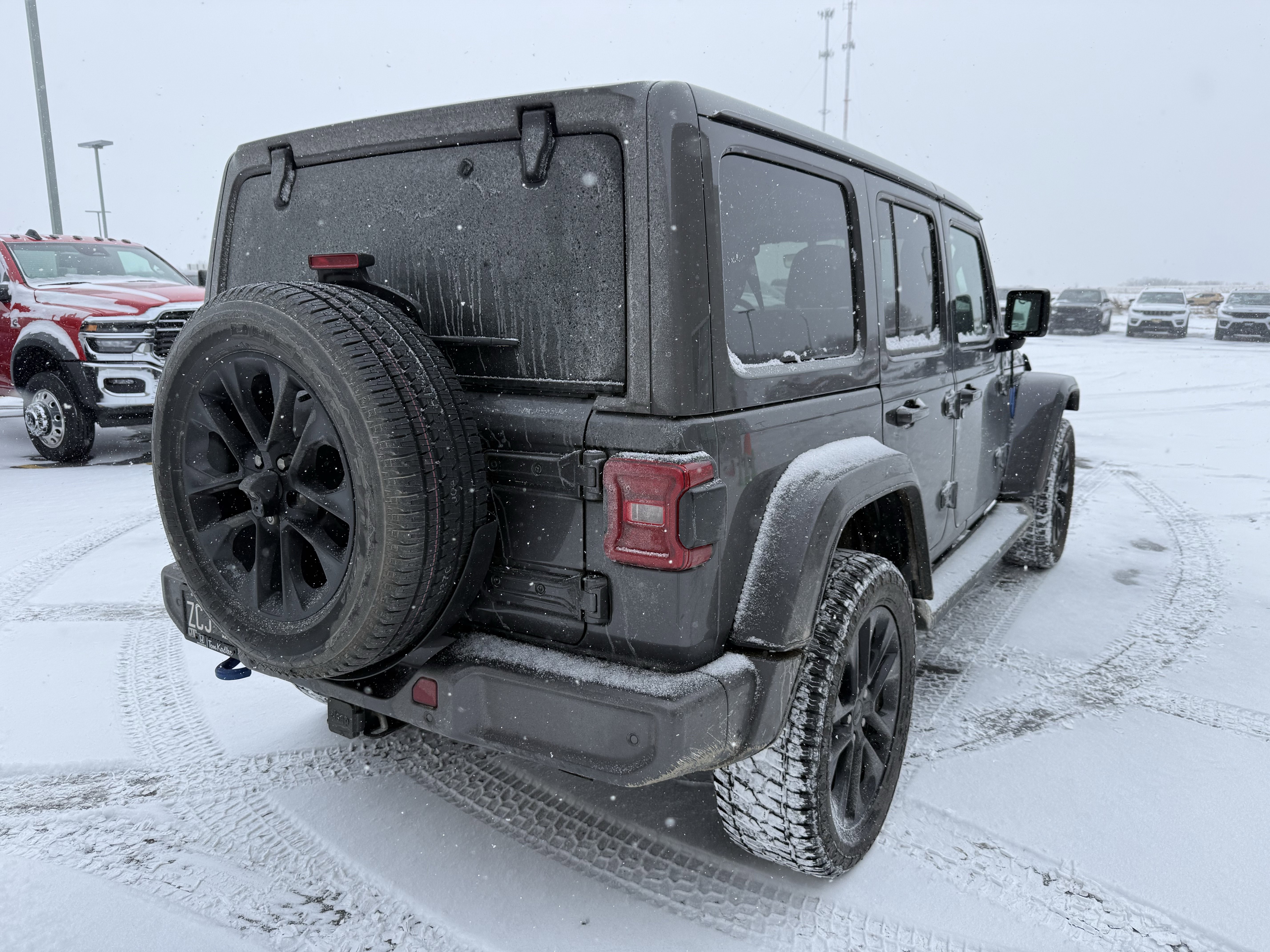 Used 2021 Jeep Wrangler Unlimited High Altitude 4XE with VIN 1C4JJXP6XMW675281 for sale in Saint Charles, Minnesota