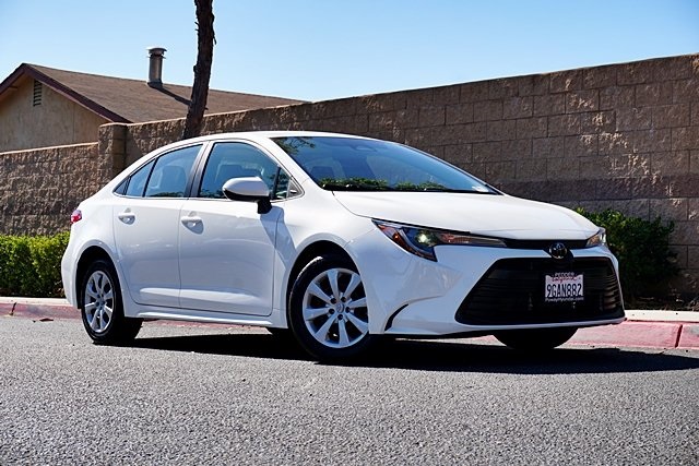 Used 2023 White Toyota LE image 1