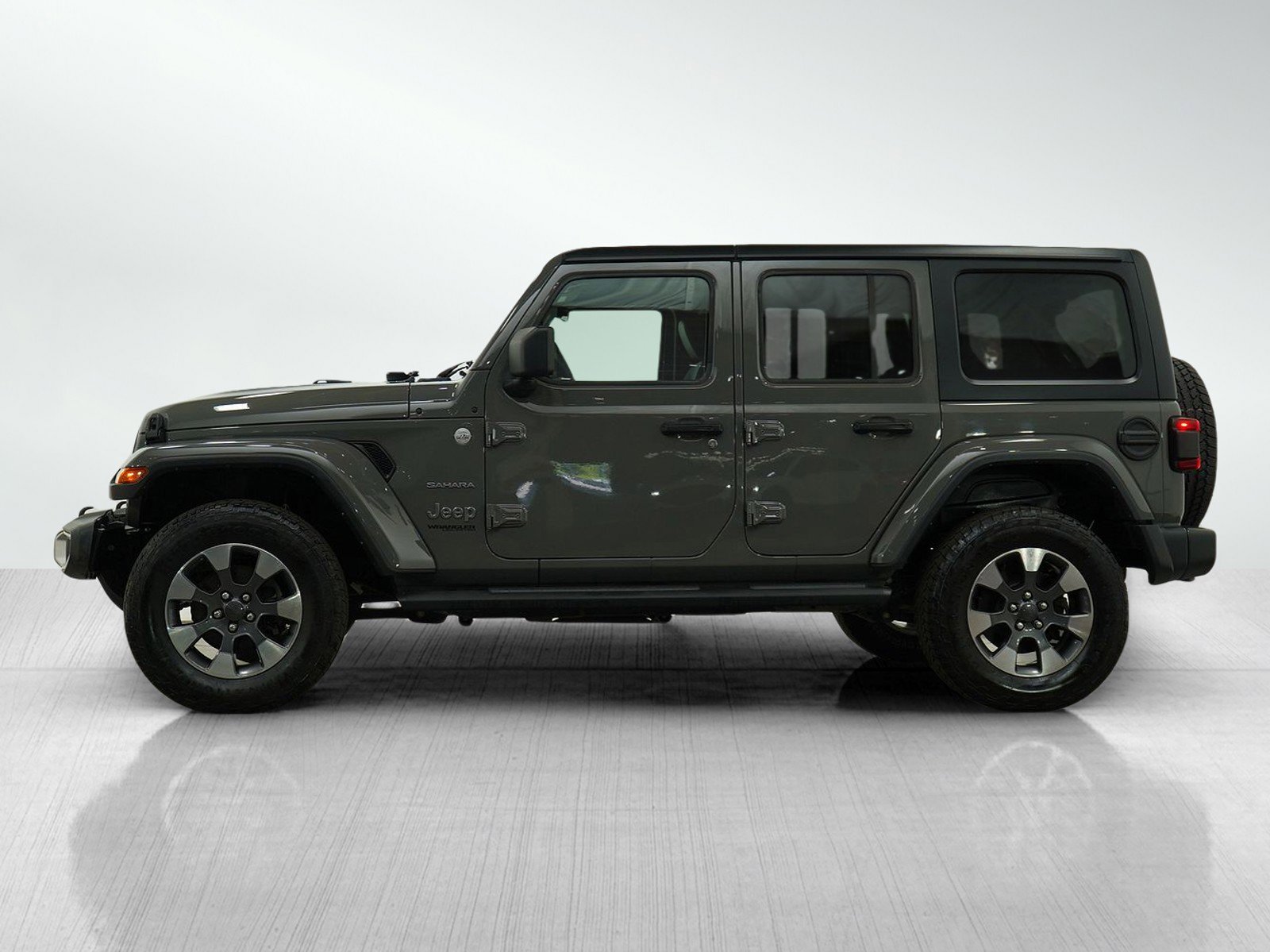 Used 2021 Jeep Wrangler Unlimited Sahara with VIN 1C4HJXEN1MW866094 for sale in Hopkins, Minnesota