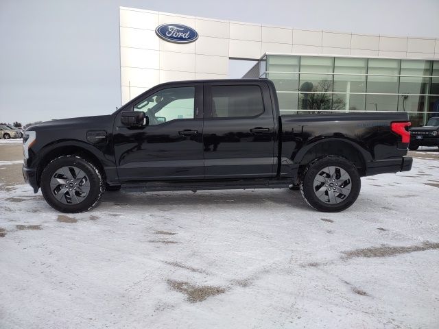 Used 2023 Ford F-150 Lightning Lariat with VIN 1FTVW1EL0PWG63055 for sale in Galesburg, IL