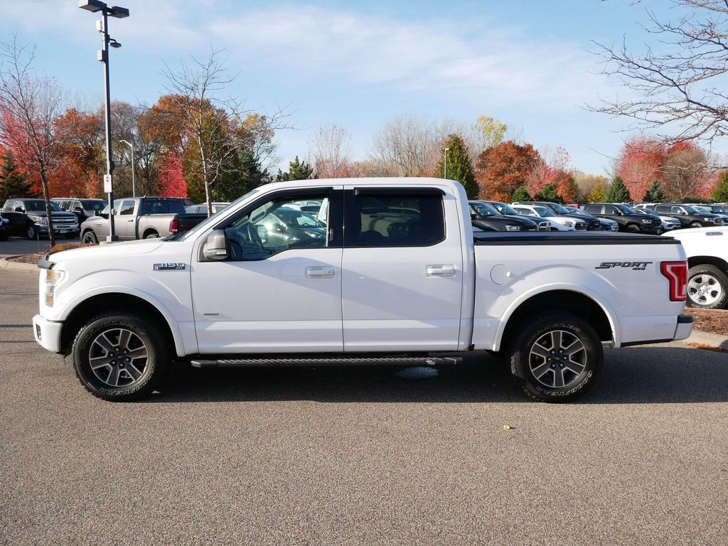 Used 2015 Ford F-150 Lariat with VIN 1FTEW1EP7FKF09676 for sale in Coon Rapids, Minnesota