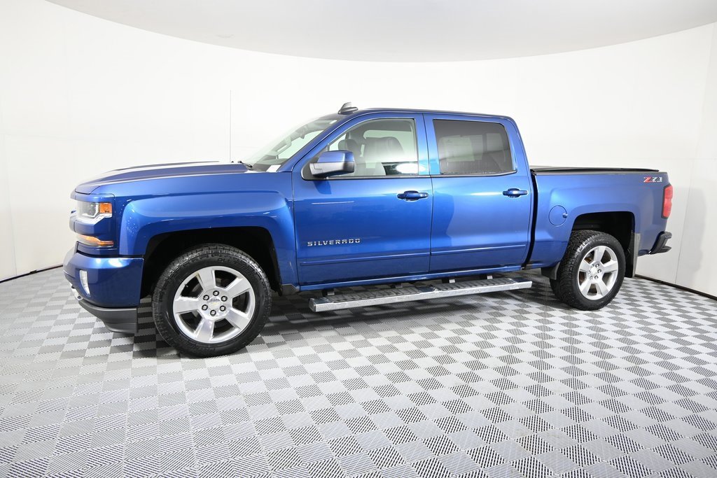 Used 2018 Chevrolet Silverado 1500 LT with VIN 3GCUKREC2JG148201 for sale in Forest Lake, Minnesota