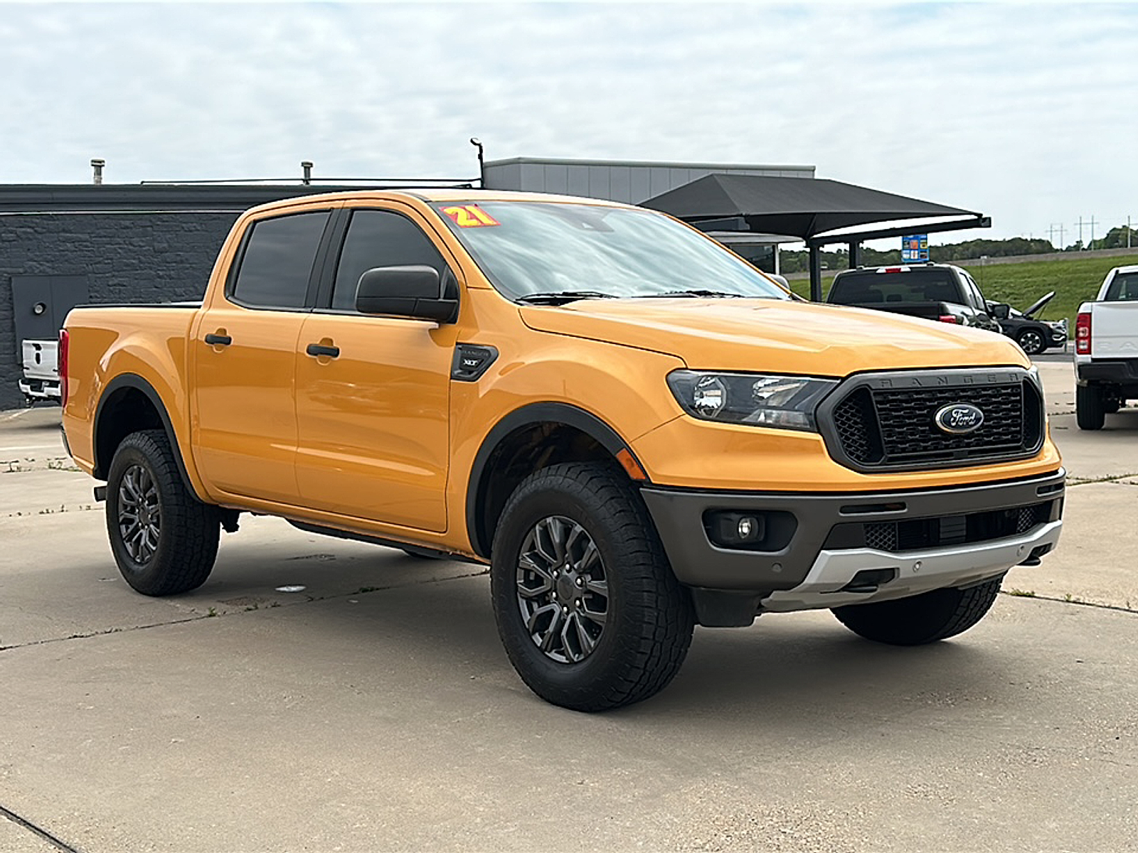 Used 2021 Orange Ford XLT image 9
