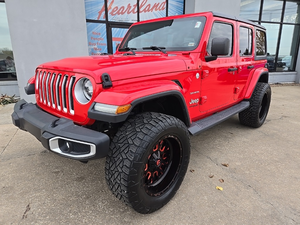 Used 2019 Jeep Wrangler Unlimited Sahara with VIN 1C4HJXEN1KW687941 for sale in Kansas City
