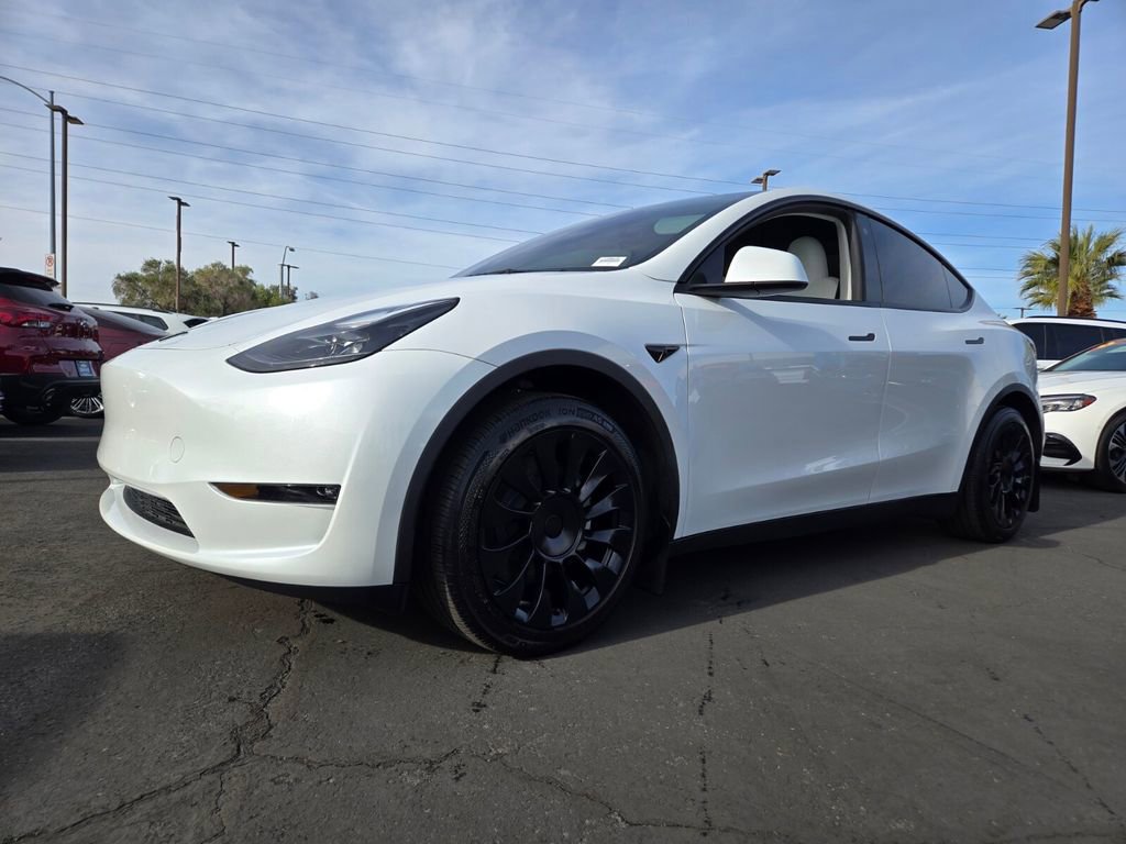 Used 2023 Tesla Model Y Long Range with VIN 7SAYGAEE6PF785311 for sale in Kansas City