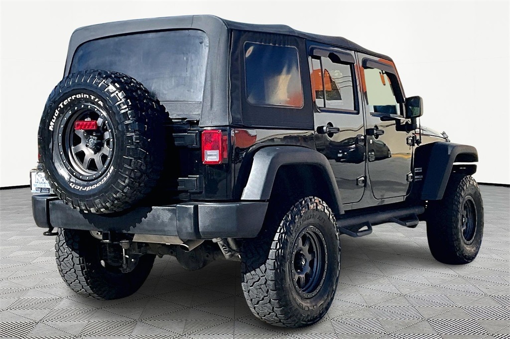 Used 2016 Jeep Wrangler Unlimited Sport S with VIN 1C4BJWDG2GL270680 for sale in Kansas City