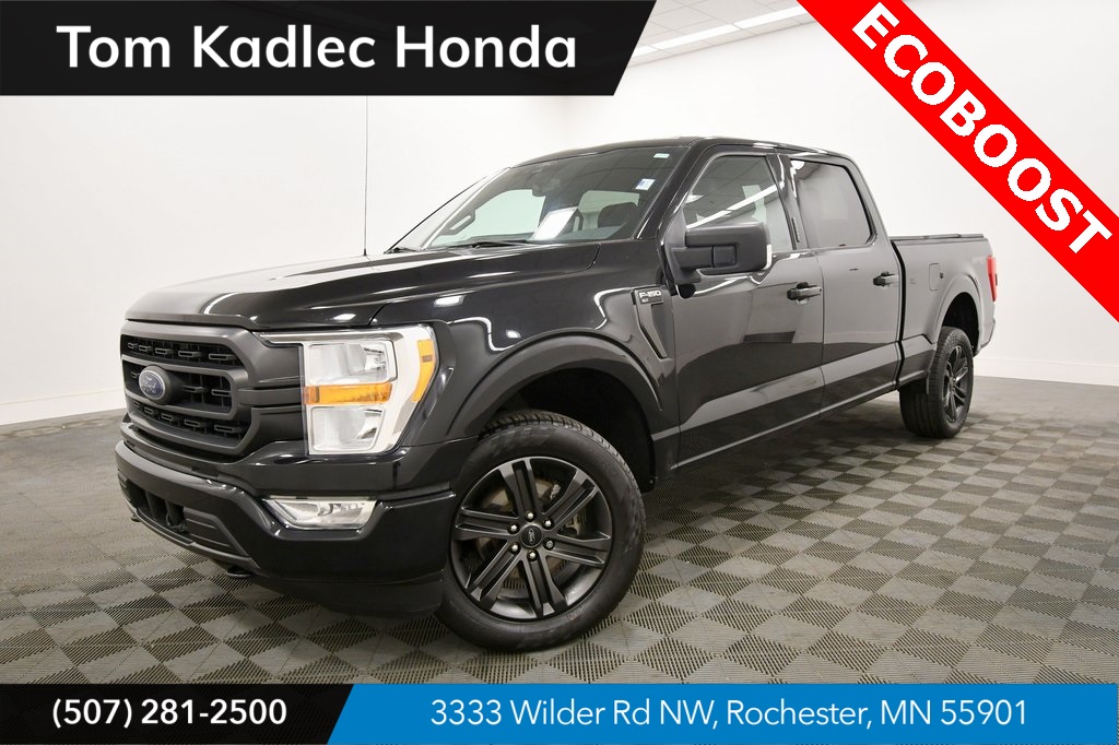 Used 2021 Agate Black Metallic Ford XLT image 1