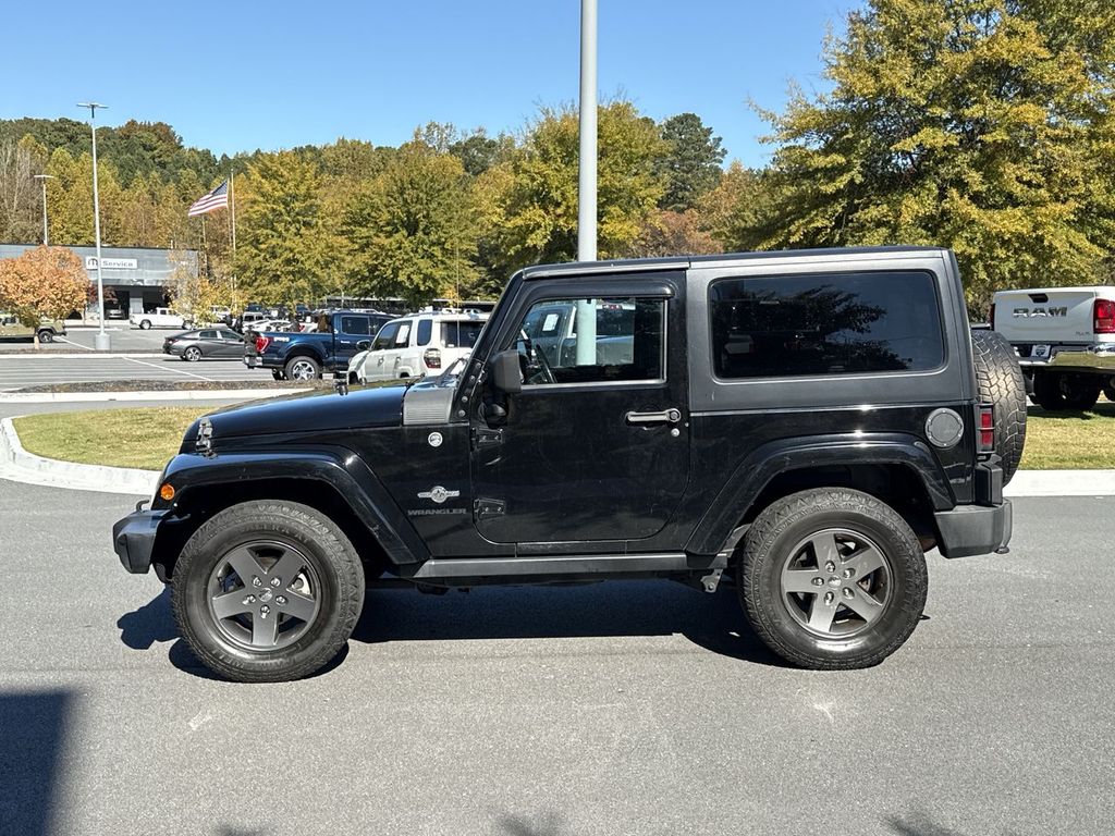 Used 2015 Jeep Wrangler Sport with VIN 1C4AJWAG4FL594003 for sale in Woodstock, GA