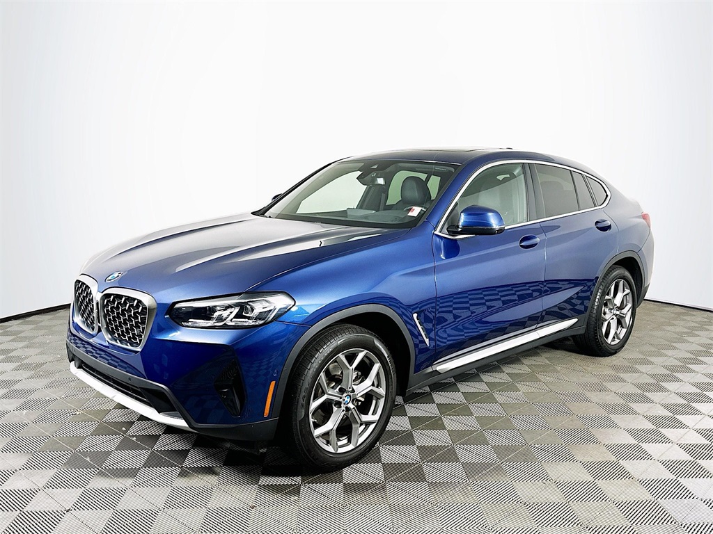 Used 2024 Phytonic Blue Metallic BMW xDrive30i image 1