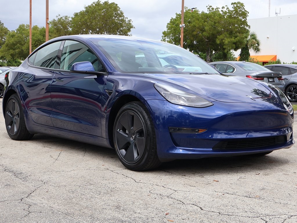 Used 2022 Tesla Model 3 Base with VIN 5YJ3E1EA3NF318662 for sale in Miami, FL