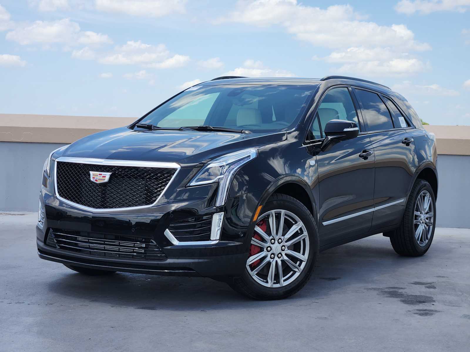 New 2025 Stellar Black Metallic Cadillac Sport image 1