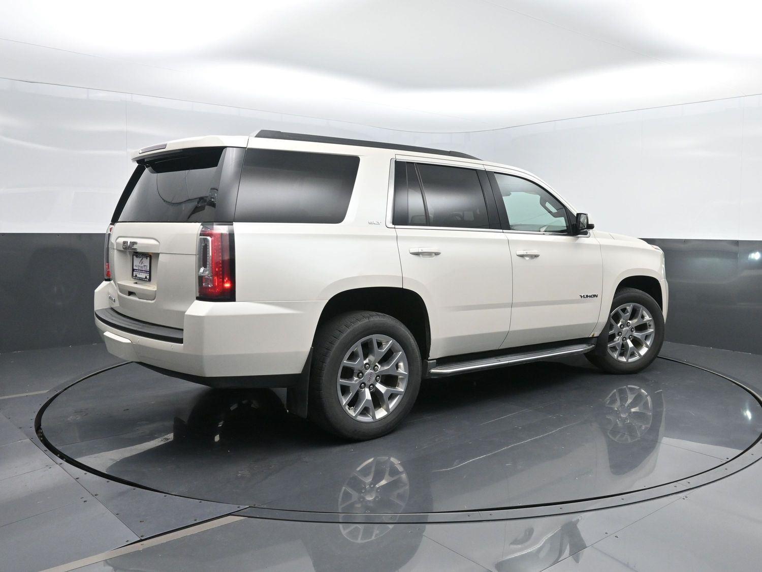 Used 2015 GMC Yukon SLT with VIN 1GKS2BKC3FR103735 for sale in Charles City, IA