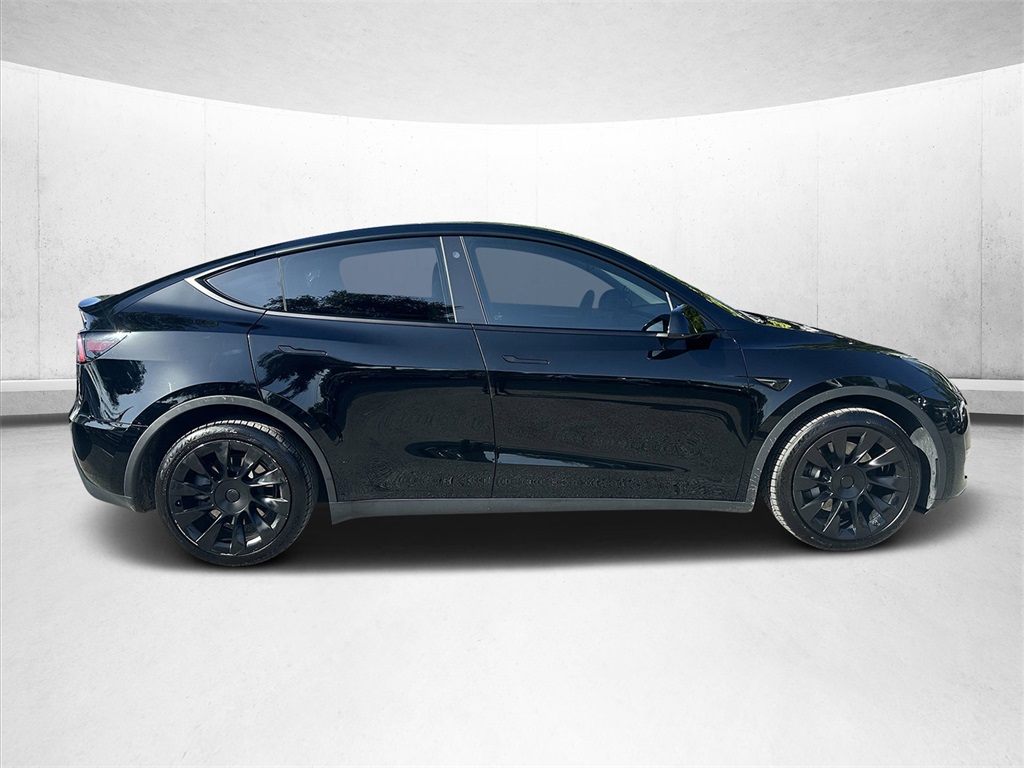 Used 2023 Tesla Model Y Long Range with VIN 7SAYGDEEXPF697010 for sale in Inverness, FL