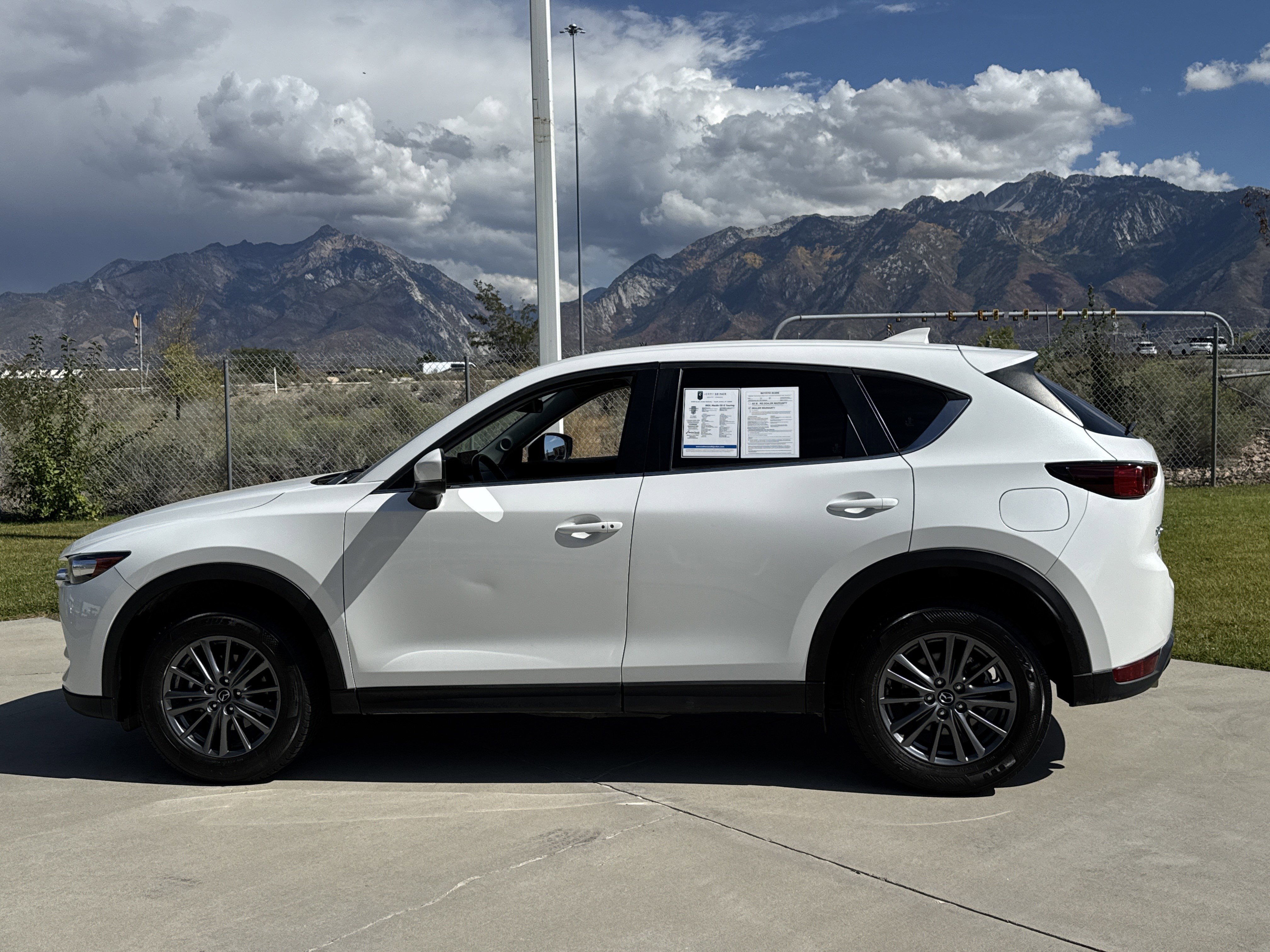 Used 2021 Mazda CX-5 Touring with VIN JM3KFBCMXM0338732 for sale in North Salt Lake, UT