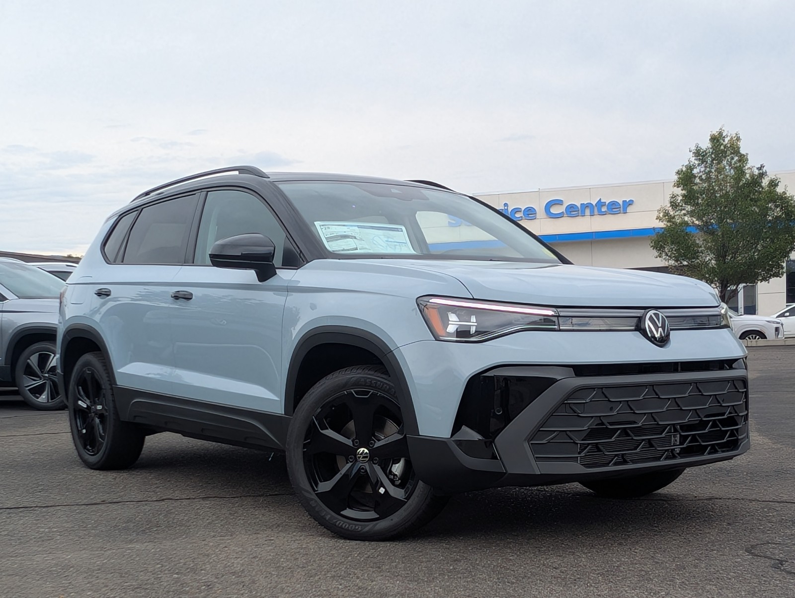 New 2025 Monument Gray w/Deep Black Roof Volkswagen SE Black image 1