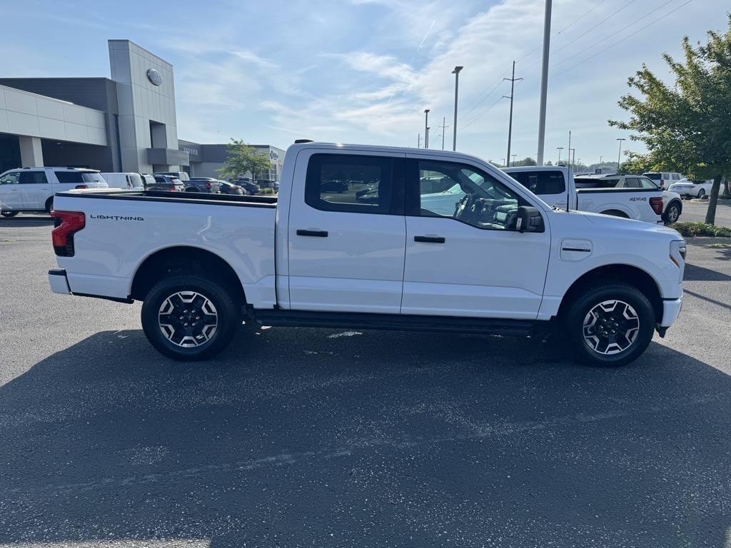 Used 2023 Ford F-150 Lightning XLT with VIN 1FT6W1EVXPWG31039 for sale in Middleton, WI