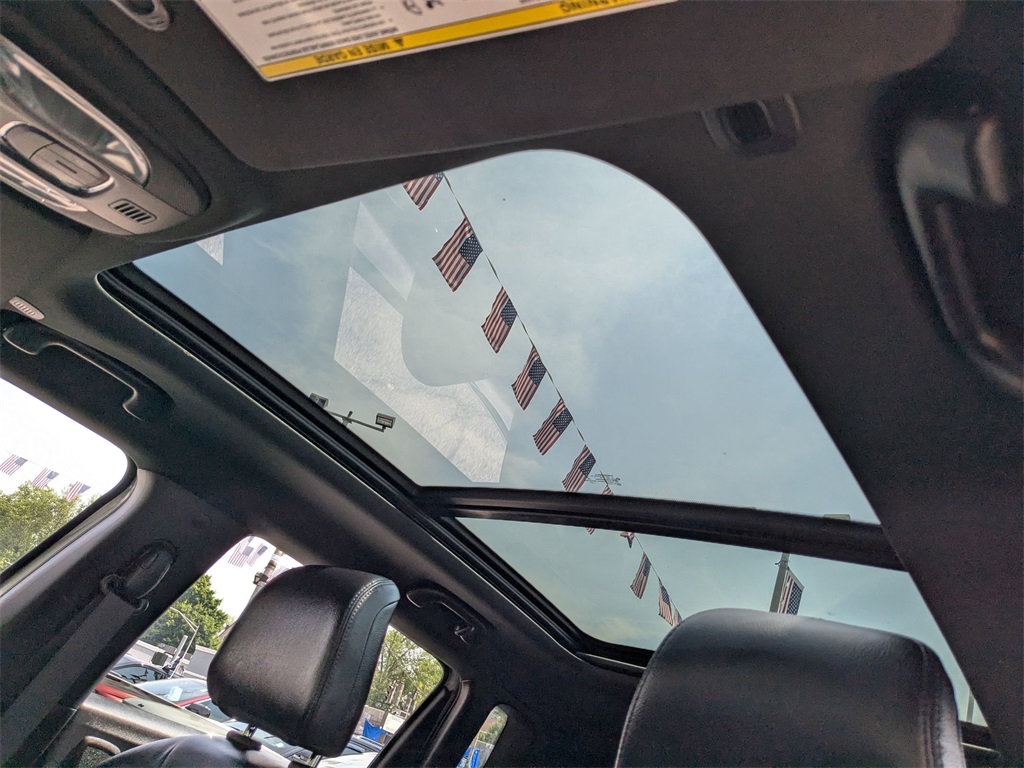 Used 2022 Silver Jeep High Altitude image 1