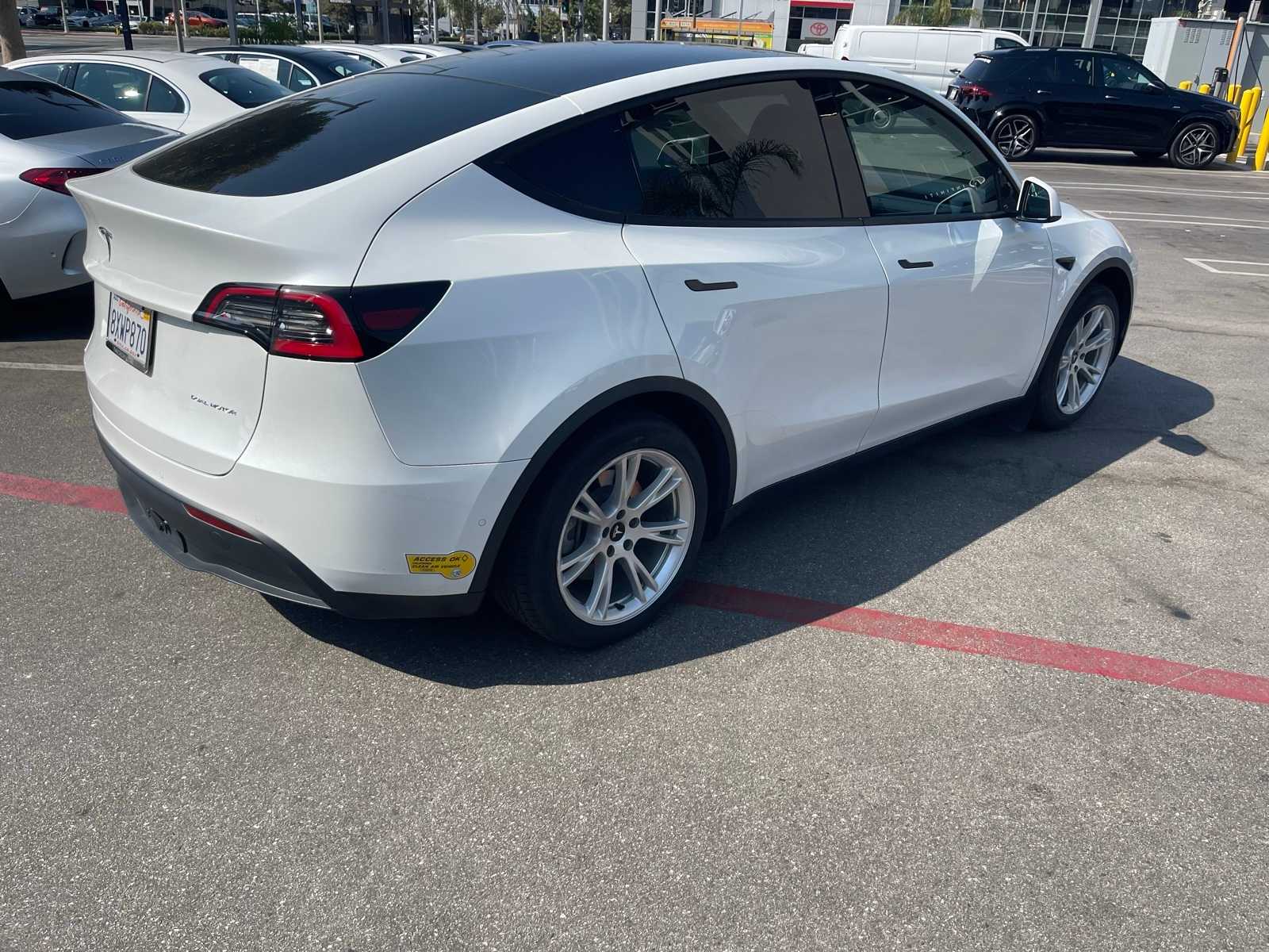 Used 2021 Tesla Model Y Long Range with VIN 5YJYGDEE0MF090560 for sale in Northfield, Minnesota