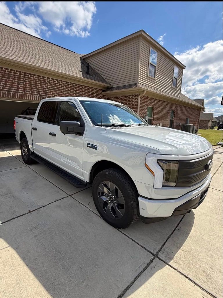 Used 2024 Ford F-150 Lightning XLT with VIN 1FTVW3LK6RWG00115 for sale in Arab, AL