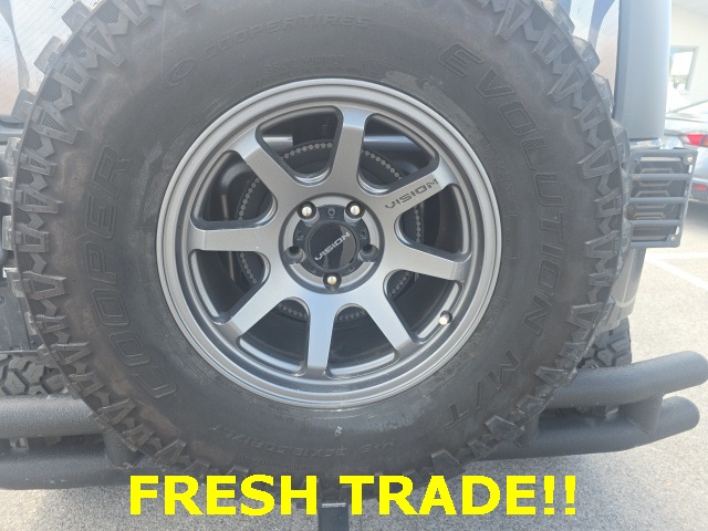 Used 2018 Gray Jeep Unlimited Sport image 1