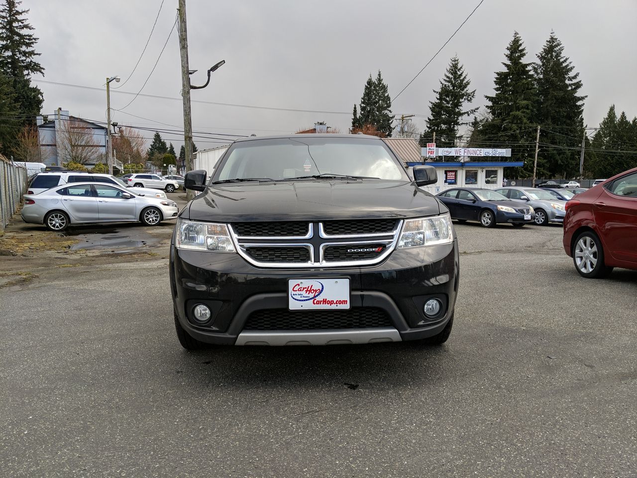 Used 2016 Black Dodge SXT Sport Utility 4D image 1