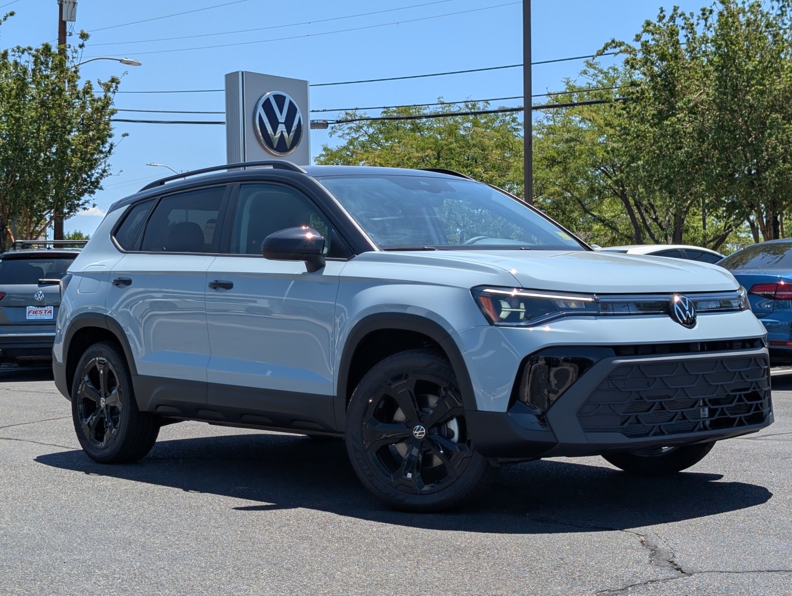 New 2025 Monument Gray w/Deep Black Roof Volkswagen SE Black image 1