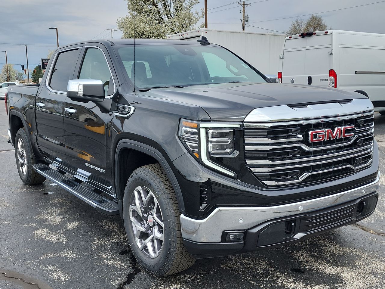 New 2025 Black GMC SLT image 1