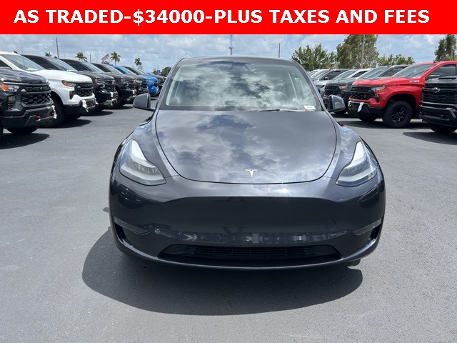 Used 2024 Tesla Model Y Long Range with VIN 7SAYGDEEXRA255392 for sale in Bradenton, FL