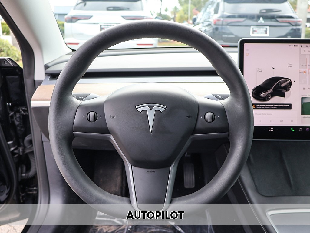 Used 2022 Tesla Model 3 Base with VIN 5YJ3E1EA8NF319077 for sale in Miami, FL