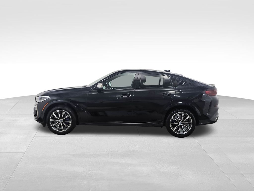 Used 2021 BMW X6 M50i with VIN 5UXCY8C00M9F09329 for sale in Minneapolis, Minnesota